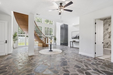 Located on approximately 1.5 gated lakefront acres just off - photo 8
