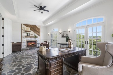 Located on approximately 1.5 gated lakefront acres just off - photo 10