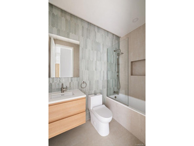 Bright, spacious, and thoughtfully designed, Unit 2F at 48 - photo 8