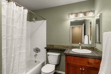 This townhouse-style condo combines comfort and style in an - photo 19