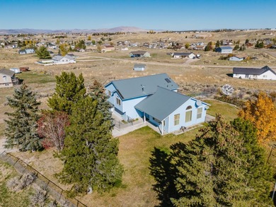 Welcome to this inviting 4-bedroom, 2.5-bath home in the Palace