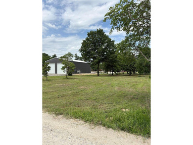Enjoy the freedom to create your ideal lake retreat on this .25 - photo 3