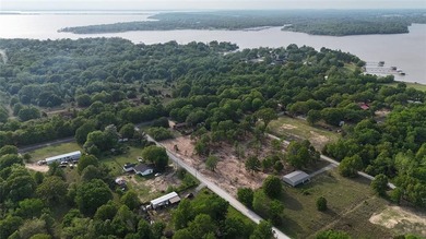 Enjoy the freedom to create your ideal lake retreat on this .25 - photo 4