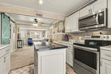 This charming 2-bedroom, 1-bath cottage in Bangor offers access - photo 11