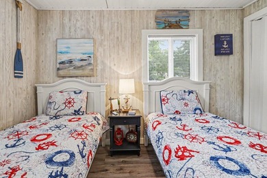 This charming 2-bedroom, 1-bath cottage in Bangor offers access - photo 17