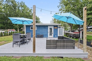 This charming 2-bedroom, 1-bath cottage in Bangor offers access - photo 20