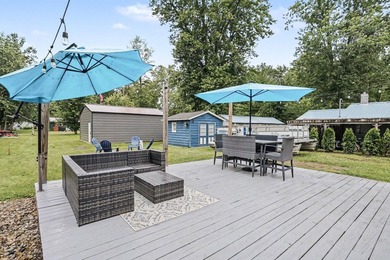 This charming 2-bedroom, 1-bath cottage in Bangor offers access - photo 24