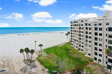 Enjoy beachfront living in this beautifully remodeled 2-bedroom - photo 1