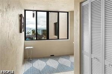 Enjoy beachfront living in this beautifully remodeled 2-bedroom - photo 4