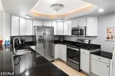 Enjoy beachfront living in this beautifully remodeled 2-bedroom - photo 5