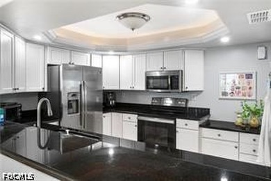 Enjoy beachfront living in this beautifully remodeled 2-bedroom - photo 6