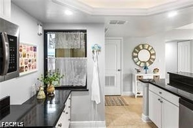 Enjoy beachfront living in this beautifully remodeled 2-bedroom - photo 8
