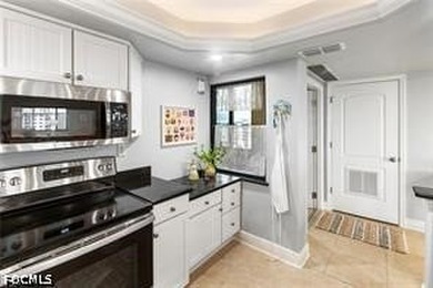 Enjoy beachfront living in this beautifully remodeled 2-bedroom - photo 9