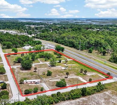Prime Investment Opportunity: 4+ Acres of Income-Producing - photo 1