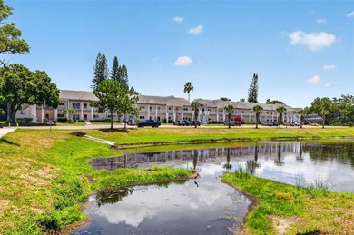 Wake up to peaceful views of a sparkling fountain pond from this - photo 1