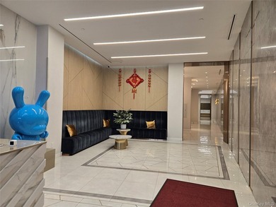 Experience luxury living in Downtown Flushing in this spacious - photo 2