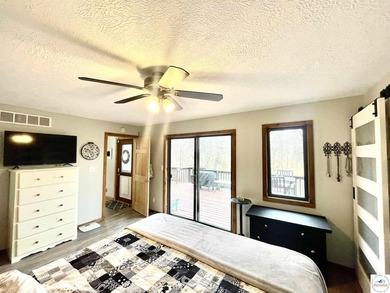 Enjoy peaceful lake living in this bright and beautiful home - photo 33