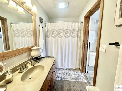 Enjoy peaceful lake living in this bright and beautiful home - photo 35