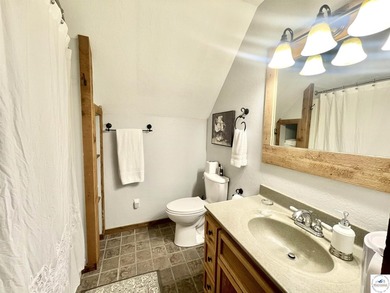 Enjoy peaceful lake living in this bright and beautiful home - photo 40