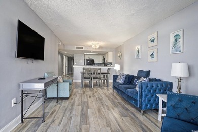 Welcome to this stunning 3-bedroom, 2-bathroom ocean-view condo - photo 6
