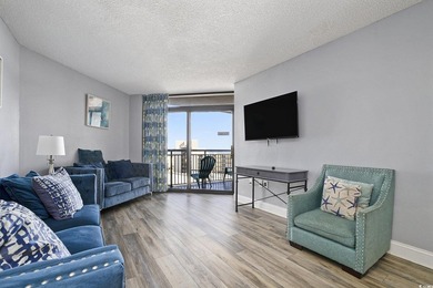 Welcome to this stunning 3-bedroom, 2-bathroom ocean-view condo - photo 7