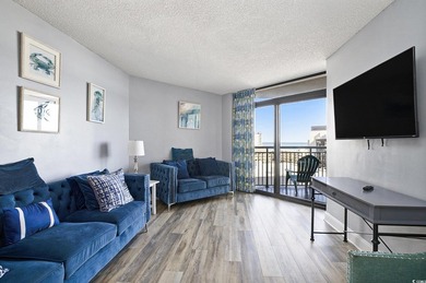 Welcome to this stunning 3-bedroom, 2-bathroom ocean-view condo - photo 8