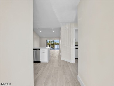 Welcome to this FULLY RENOVATED condo offering tranquil lake - photo 7