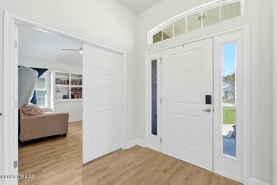 Welcome to this beautifully maintained 2021-built home in Palm - photo 3