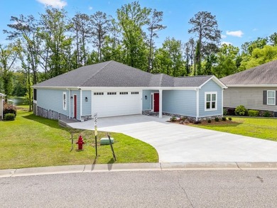 New Construction waterfront home on gently sloping lot on - photo 2