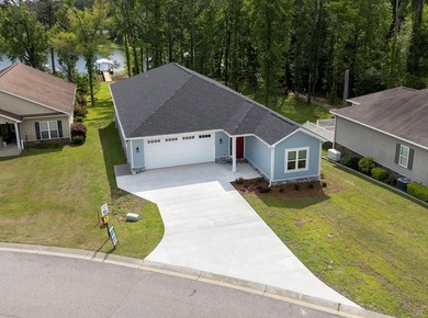New Construction waterfront home on gently sloping lot on - photo 3