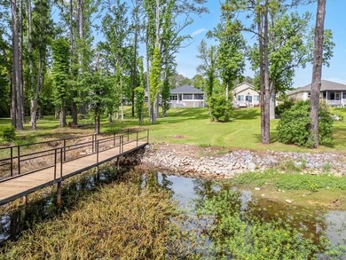 New Construction waterfront home on gently sloping lot on - photo 8