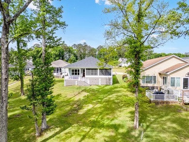 New Construction waterfront home on gently sloping lot on - photo 9