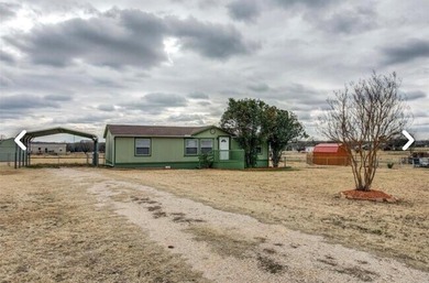 Lake Home For Sale in Azle, Texas