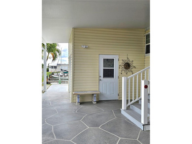 Discover this stunning waterfront dream home in the vibrant - photo 3