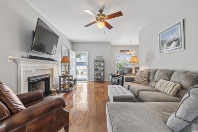 This spacious five-bedroom, four-bathroom raised beach home is