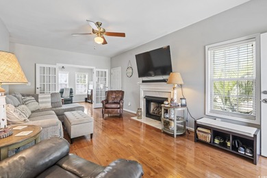 This spacious five-bedroom, four-bathroom raised beach home is