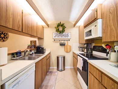 Complete impact sliders and brand-new A/C! This cozy townhome - photo 6