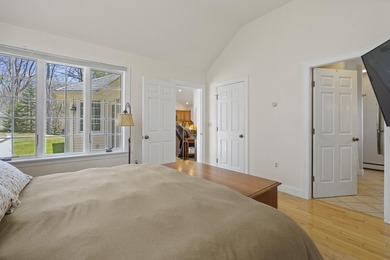This custom ranch offers refined one-floor living with three - photo 32