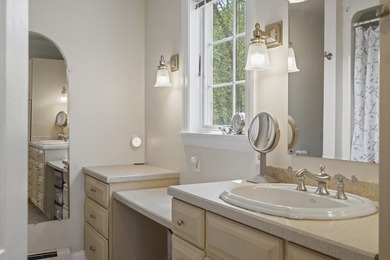 This custom ranch offers refined one-floor living with three - photo 33