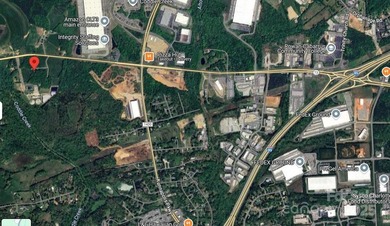 21.95 +/- acres on Hwy 73 in a rapidly developing area. Current - photo 2