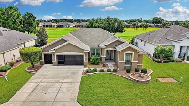Paradise truly awaits in this beautifully updated, custom-built - photo 1