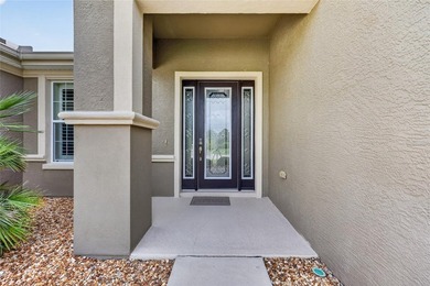 Paradise truly awaits in this beautifully updated, custom-built - photo 4