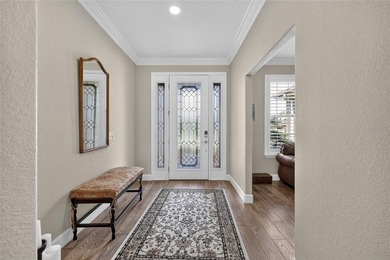 Paradise truly awaits in this beautifully updated, custom-built - photo 6