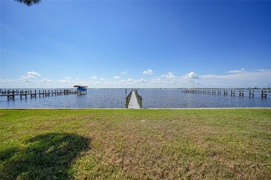 Virtually Staged. Experience exceptional waterfront living in - photo 8