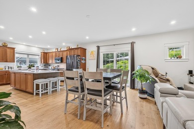 This home features a spacious first-floor primary suite with a - photo 12