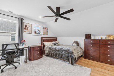 This home features a spacious first-floor primary suite with a - photo 22