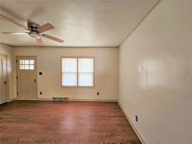 Bungalow style home on .5 acres in Saydel school system in NE