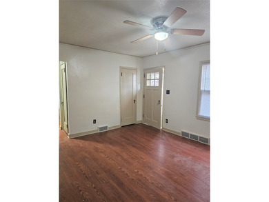 Bungalow style home on .5 acres in Saydel school system in NE