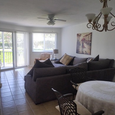 Welcome to this charming two-bedroom, two-bathroom condominium - photo 7