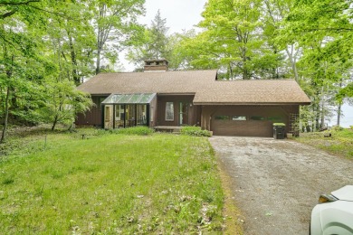 Lake Home For Sale in Williamsburg, Michigan